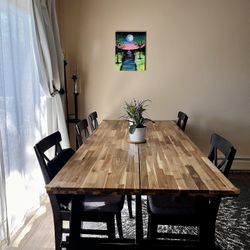 SKOGSTA Dining table, acacia/black, 92 1/2x39 3/8 "