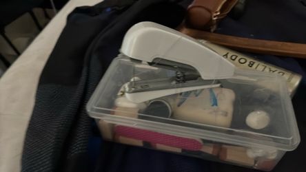 Portable handheld sewing machine