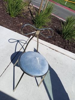 Chair  With Metal Bow Design