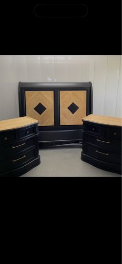 Black sleigh bed and nightstands