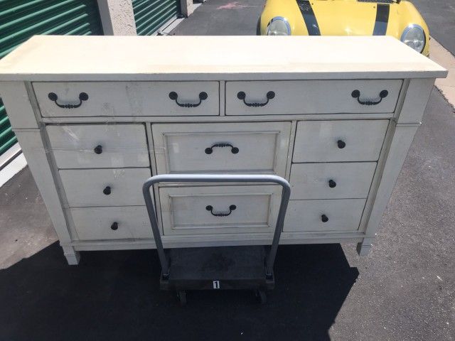 White slightly distressed 10 drawer dresser And Night Stand