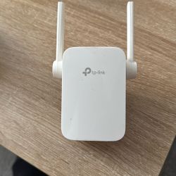 The TP-Link TL-WA855RE is a compact, 300Mbps single-band (2.4GHz) Wi-Fi range extender