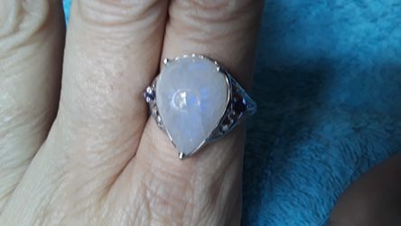 Unique Carved 5 Carat Moonstone ring with Tanzanite accents.