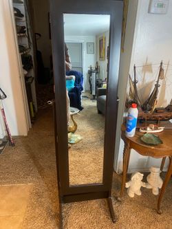 Stand up mirror with jewelry cabinet