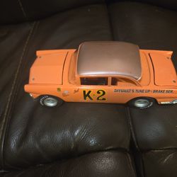 The diecast car pictured is a Dale Earnhardt K-2 1956 Ford Victoria in 1:24 scale.
