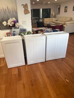 New 3 white shaker upper Cabinets 36”tall by 12 inches deep by 30 inches, 24 inches, and 21 inches wide