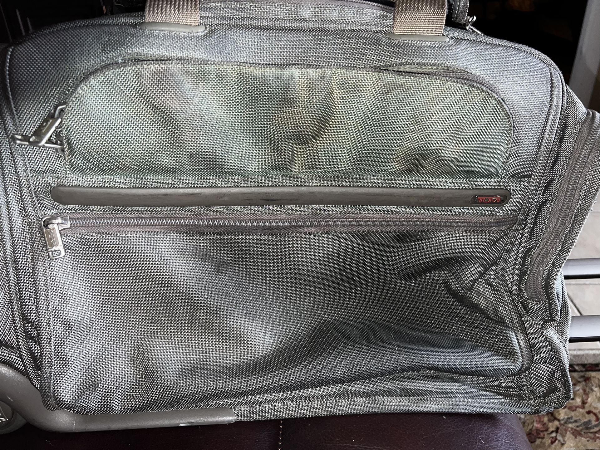 Tumi Gray Rolling Carry On Bag