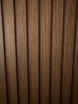 Stylish IKEA BESTÅ cabinet with brown oak veneer BJÖRKÖVIKEN fronts and a black-brown frame.