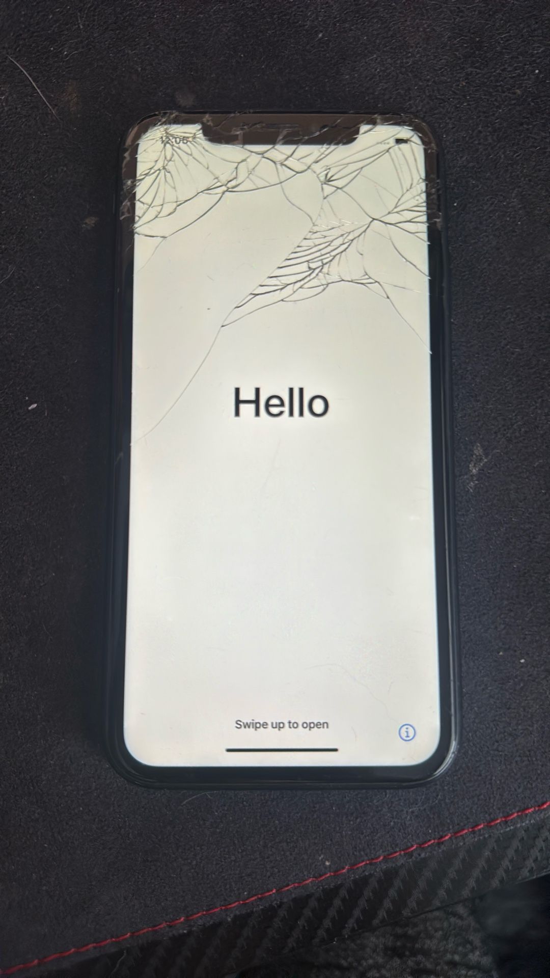 iPhone XR 64 GB (unlocked, cracked screen but still works perfectly)
