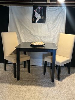 2 chairs and table