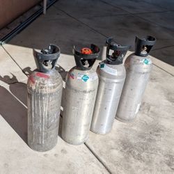 4 Empty CO2 Tanks. $50 Each. 180 For All 4