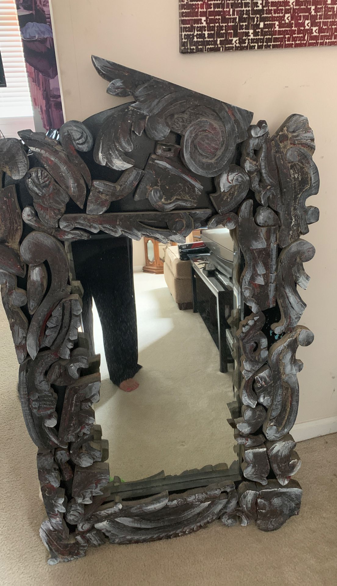 Hand carved wood mirror. I don’t know the origin or where it was bought originally, but it is beautiful.