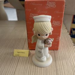 Precious Moments “Angel Of Mercy” 102482