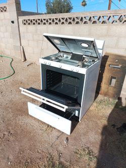 Gas stove  , refrigerator  ,   white  roper brand