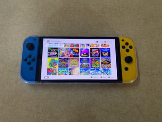 NINTENDO SWITCH OLED + 512GB SD Loaded with 125 SWITCH GAMES and Over 7000 Retro Games