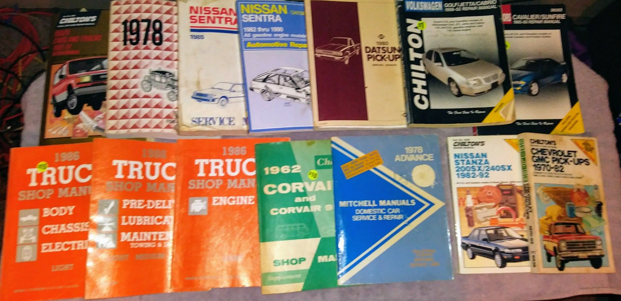 MIXED LOT OF 13 CAR MANUALS – 1962 to 2003
