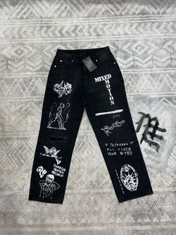 Mixed Emotion black jeans with white graphic