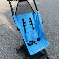 Clutch Stroller by Delta Children and two accessories (a Rain cover and a Sun Cover) in Like New Conditions 