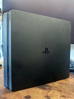 PS4 slim (with upgraded 1TB SSD)
