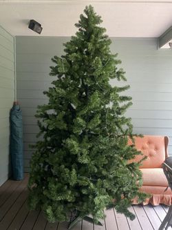 Christmas Tree 8’ . Comes apart
