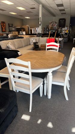 New ashley farmhouse 6pc set was $2499 now $1200. Really nice with leaf