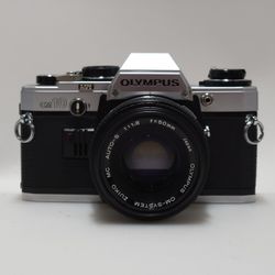Olympus OM10 35mm Film Camera w/ f/1.8 50mm Lens
