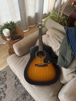 Epiphone pro-1 VS Acoustic Guitar