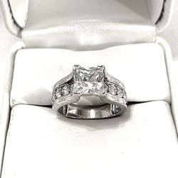 Brand New Princess Cut Cubic Zirconia CZ Diamonds Set In A Sterling Silver Wedding Ring. Size 5