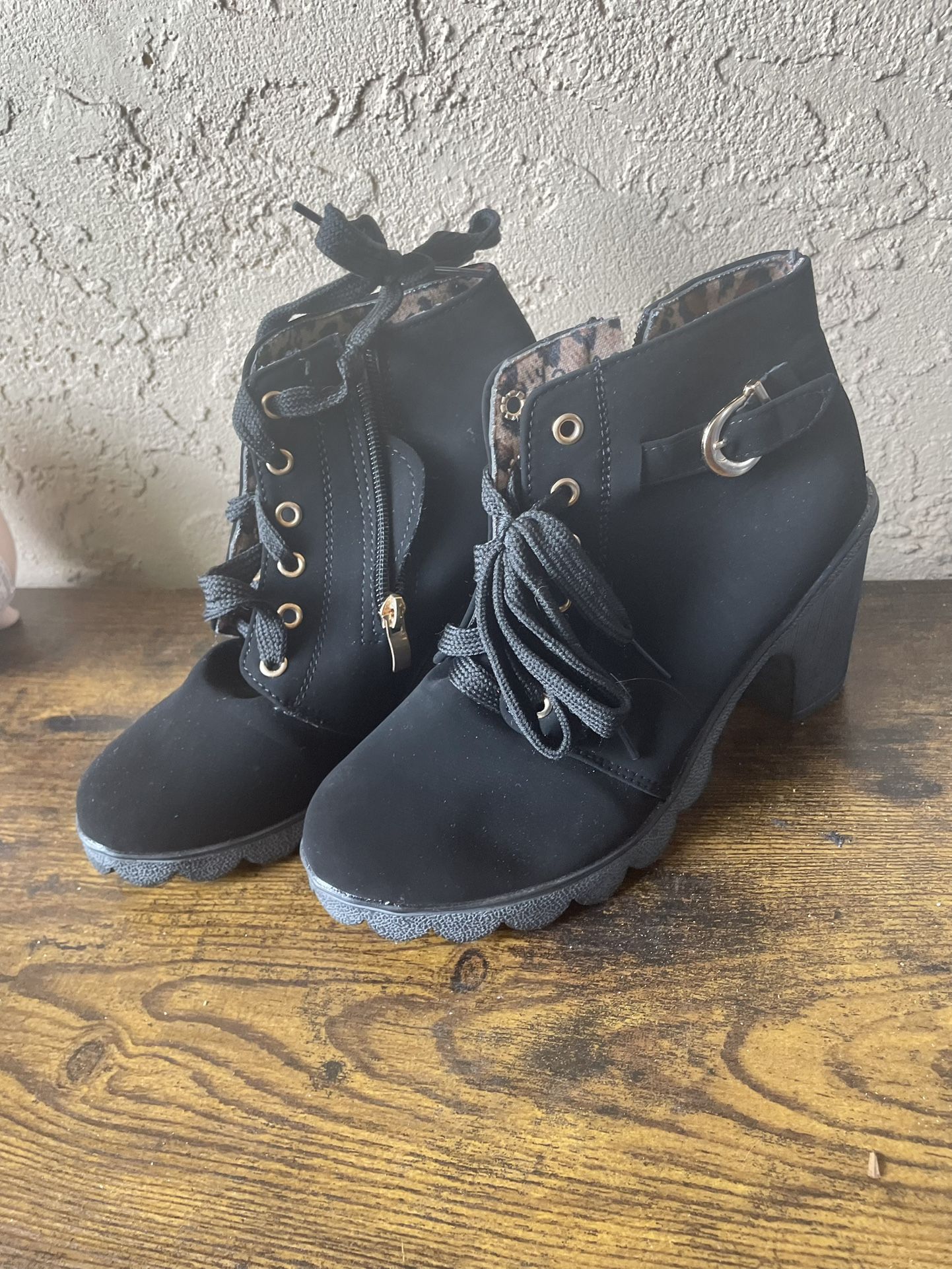 black and leopard heel boots