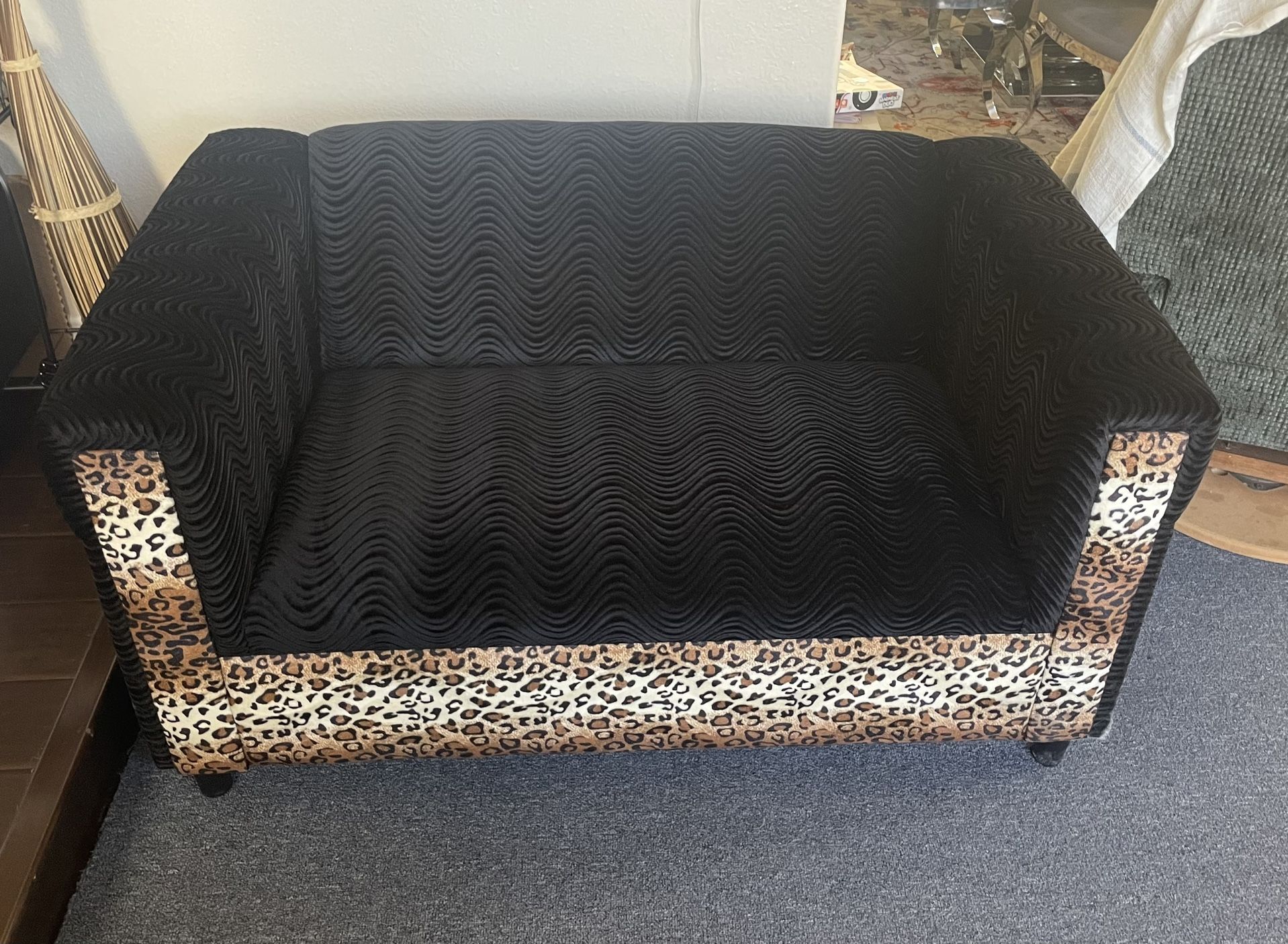 Black Couch With Leopard Print