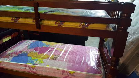 Brand new bunk bed with your choice of bedding