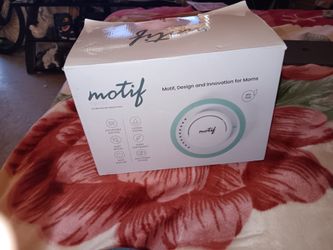 Motil twist double breast pump