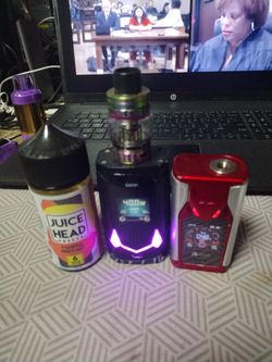 Two high power tanks with a bottle of liquid