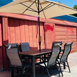 Felton Falls 9 Piece Padded Sling Outdoor Dining Set with Umbrella and base