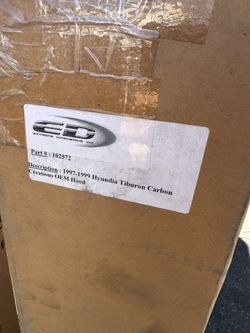 1(contact info removed) Hyundai Tiburon Caron Fiber Hood OEM Style