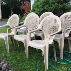 Six Stackable Plastic Chairs 