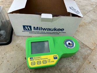 Refractometer and 2 Reef master test kits