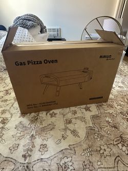 Like-new portable gas pizza oven – unused gift, must sell!