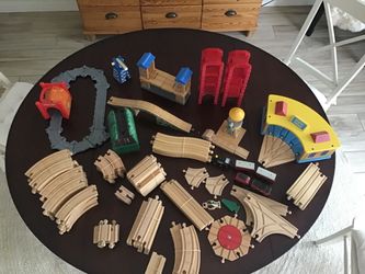 Wooden train tracks and engine house