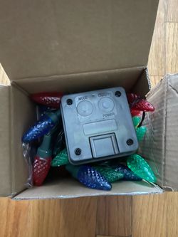 Solar Powered Outdoor Multicolor Christmas String Lights - Brand New in Box Description: Brand new solar-powered outdoor LED string lights with multic