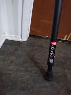In motion ergonomic adjustable cane like New