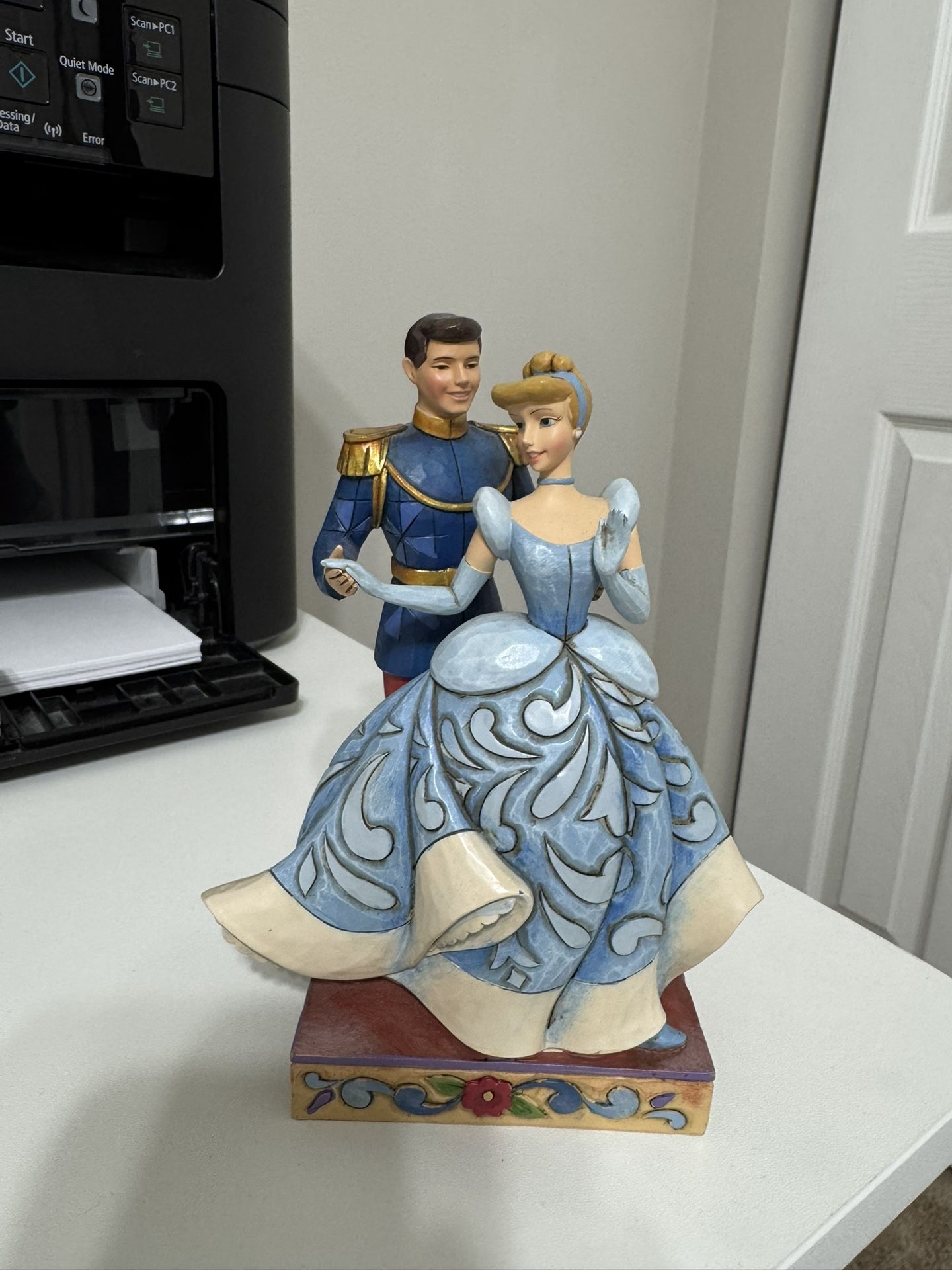 Jim Shore Disney Traditions figurine of Cinderella and Prince Charming.