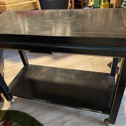 Antique table with wheels 