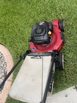 Red Toro Bull Recycle lawnmower self propelled