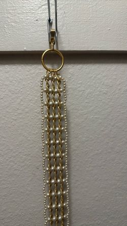 pearl intertwined with wrap uniqueded d around gold chain belt