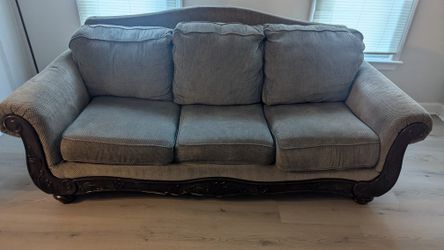 brown couch needs to be picked up