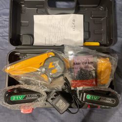 Mini Chain Saw Brand New With 2 Batteries 