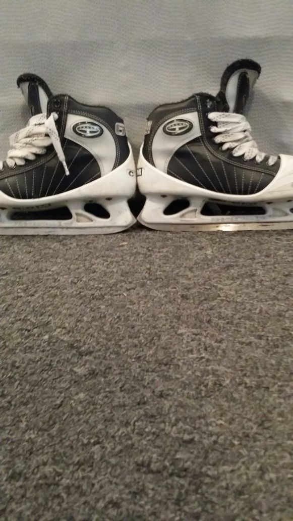 Goalie skates.