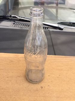 Empty Coca Cola bottle