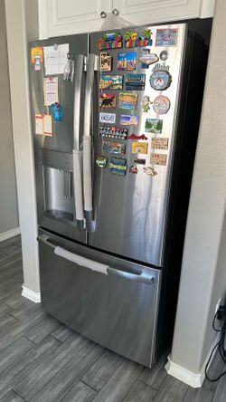 French Door Refrigerator with Water Dispenser & Bottom Freezer – $600